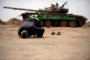 Кадафи затруднява НАТО с тактика