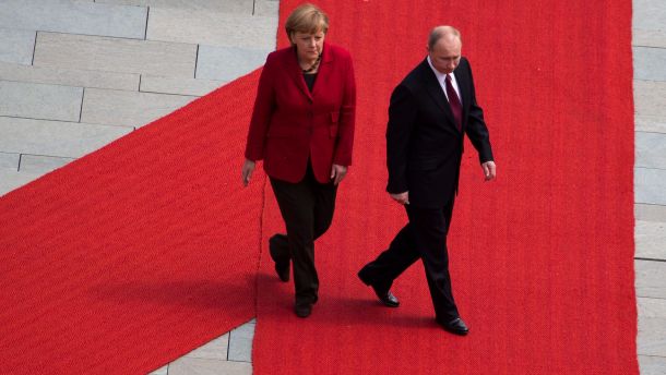 Путин и Меркел